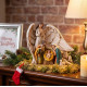 MagicHome Christmas decoration, Holy family under the wings of an angel, polyresin, 21.5 cm